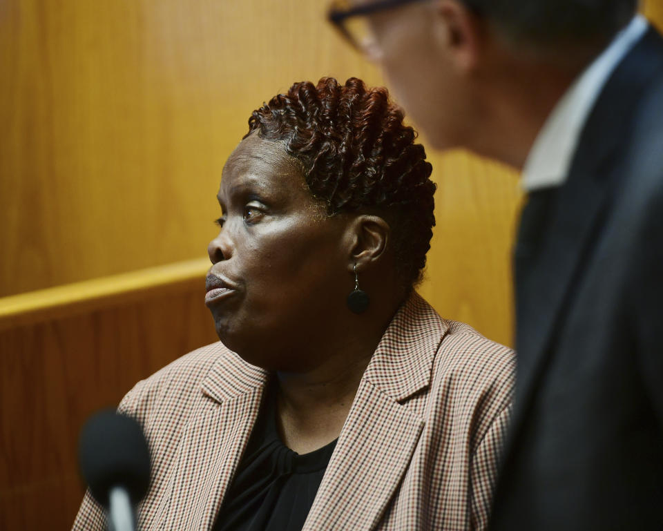 Wanda Geter-Pataky reacts as she watches video of herself placing absentee ballots into election drop boxes, during Bridgeport Democratic Primary Mayoral candidate John Gomes' challenge of absentee ballots in Superior Court in Bridgeport, Conn., Friday, Oct. 13, 2023. Geter-Pataky was advised by her lawyer to not answer questions regarding the absentee ballots to avoid self incrimination. (Brian A. Pounds/Hearst Connecticut Media via AP, Pool)