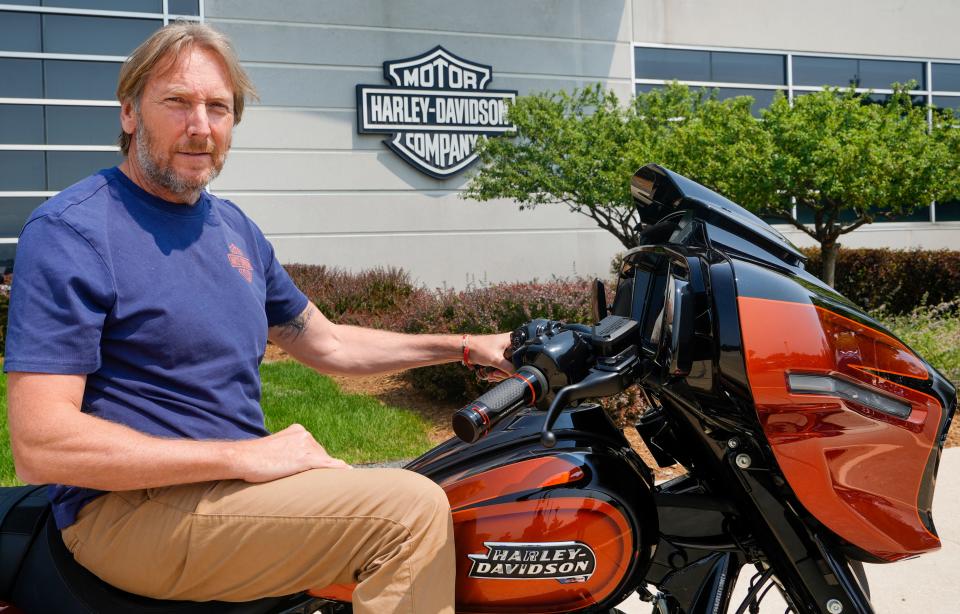 Harley-Davidson CEO Jochen Zeitz seen with the 2023 CVO Road Glide motorcycle  at the Harley-Davidson Product Development Center in Wauwatosa.