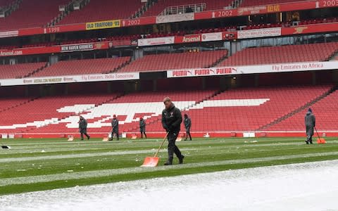 Arsenal workers - Credit: Getty images