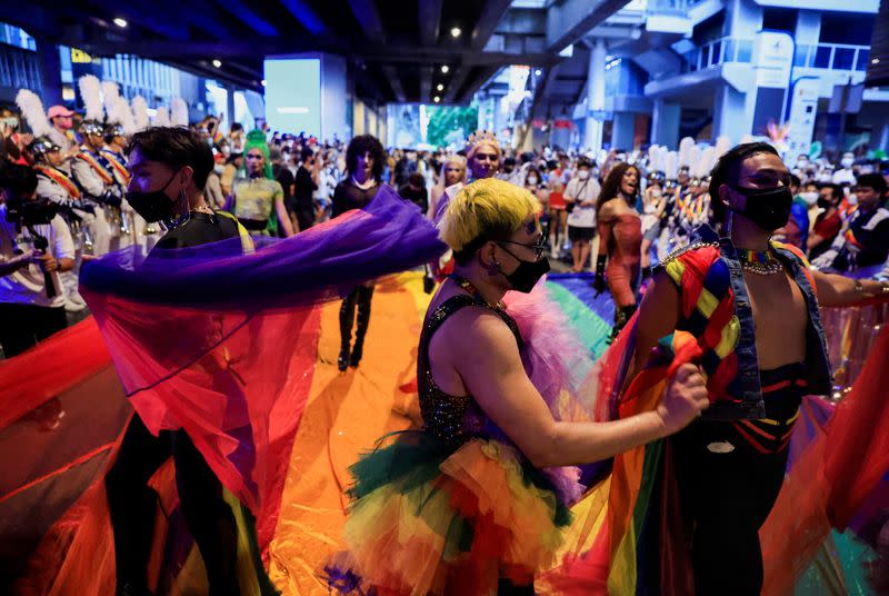 People attend a LGBTQ+ Pride parade, in Bangkok