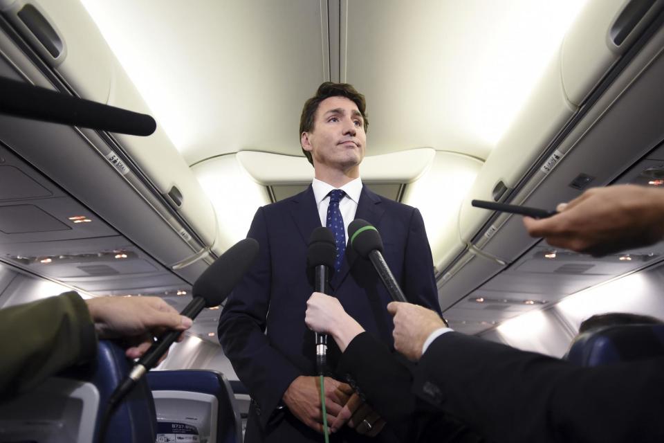 Mr Trudeau asked Canadians to forgive him following the controversy (AP)