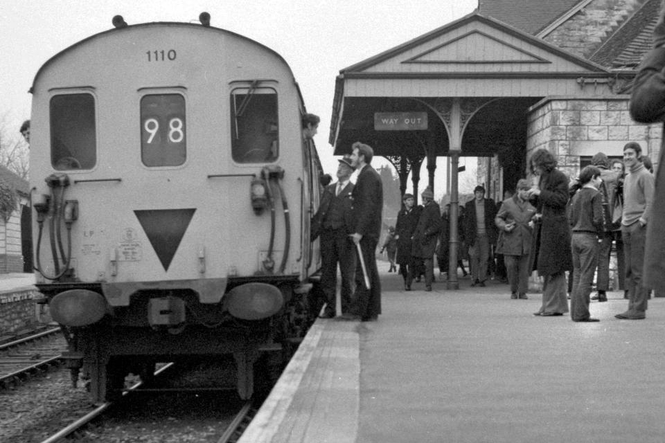 Peter Frost, pictured second from right, at the age of 13 on the Corfe Castle platform with his back to the train on the last day the service ran on January 1, 1972 (Ian Nolan/PA)