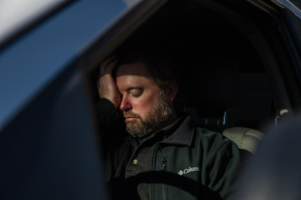Mike Kurtz sits in his truck to decompress for a few minutes after working more than 10 hours. (Photo: Ariana Drehsler for HuffPost)
