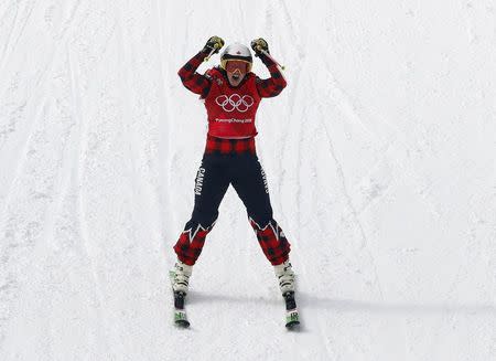 Freestyle Skiing - Pyeongchang 2018 Winter Olympics - Women's Ski Cross Finals - Phoenix Snow Park - Pyeongchang, South Korea - February 23, 2018 - Kelsey Serwa of Canada celebrates winning the final. REUTERS/Jorge Silva