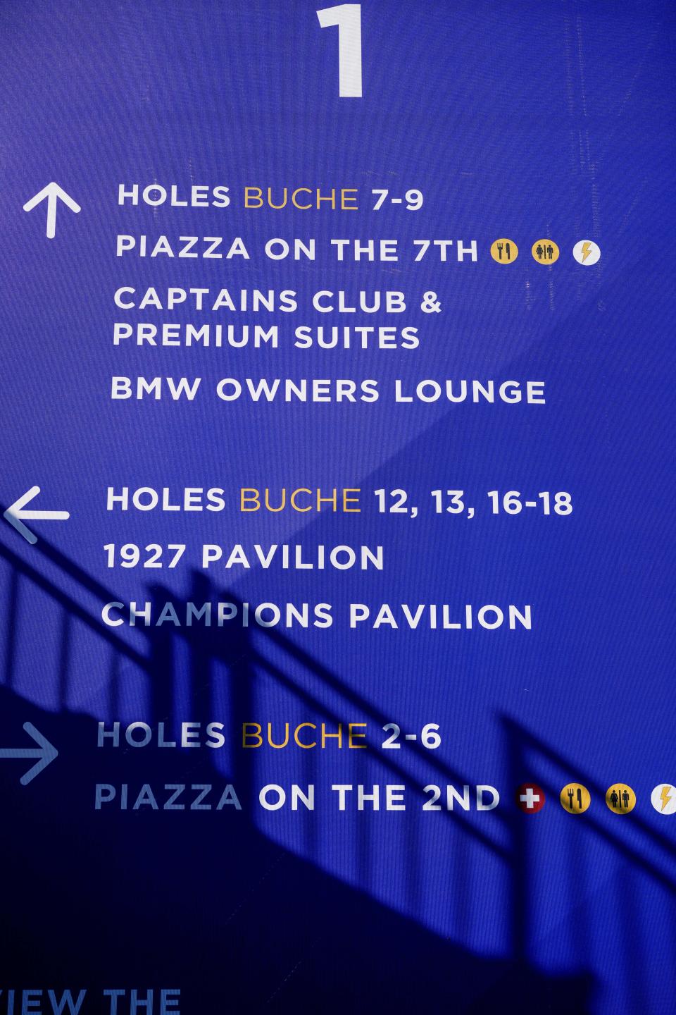 A sign with directions in English and Italian on the course of the Marco Simone Golf Club in Guidonia Montecelio, Monday, Sept. 25, 2023. The Marco Simone Club on the outskirts of Rome will host the 44th edition of The Ryder Cup, the biennial competition between Europe and the United States headed to Italy for the first time. (AP Photo/Andrew Medichini)