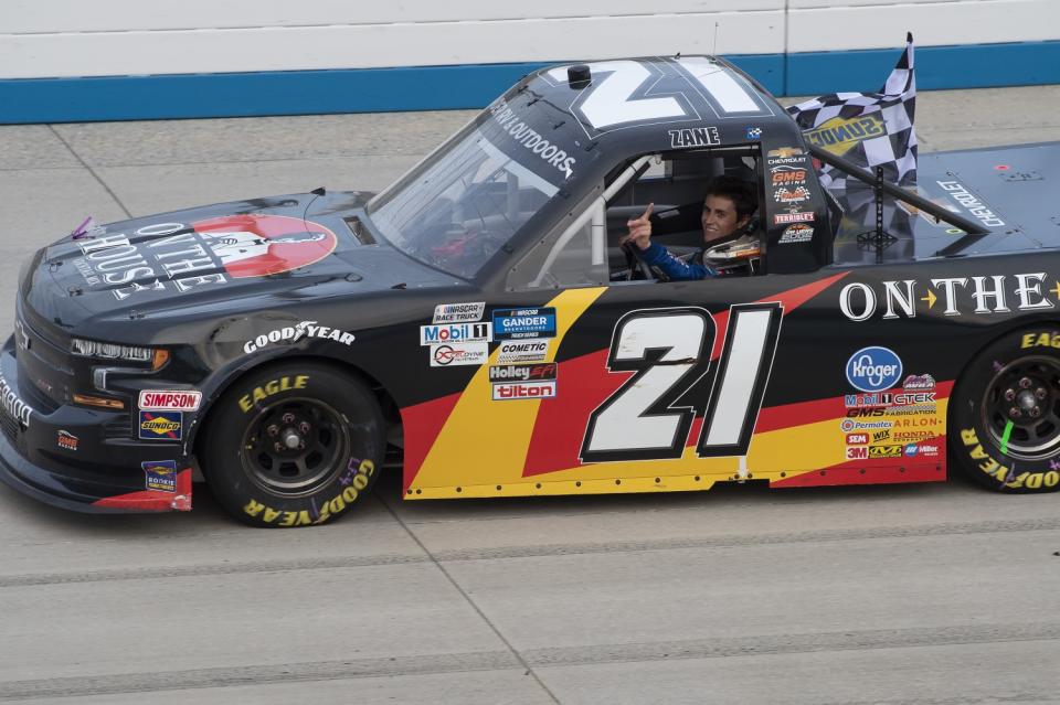 Zane Smith celebrates after winning the NASCAR truck series race Aug. 21 at Dover International Speedway.