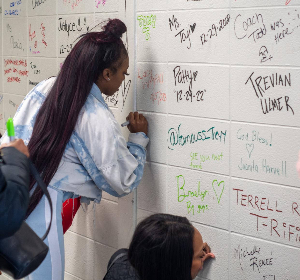 Numerous members of the South Bend community signed the walls of the old Martin Luther King, Jr. Community Center before it gets torn down and replaced.