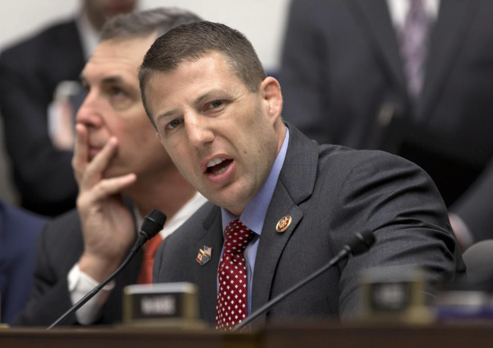 FILE - In this May 16, 2013 file photo, House Transportation and Infrastructure Full Committee member Rep. Markwayne Mullin, R-Okla. speaks on Capitol Hill in Washington. Democrat Debra Haaland an enrolled Laguna Pueblo member won a seat in New Mexico's 1st congressional district and Democrat Sharice Davids who is Ho-Chunk won in Kansas' 3rd congressional district Tuesday, Nov. 6, 2018. They will join U.S. Reps. Tom Cole, who is Chickasaw, and Mullin, an enrolled citizen of the Cherokee Nation, in the House. Cole and Mullin are Republicans, representing districts in Oklahoma (AP Photo/Carolyn Kaster, File)