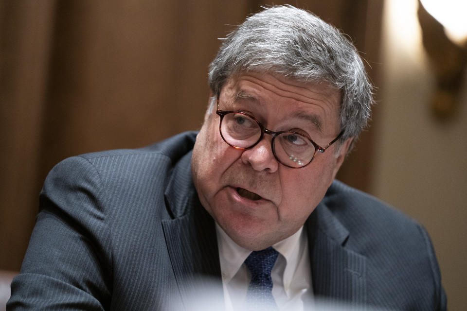 FILE - In this Sept. 23, 2020, file photo, Attorney General William Barr speaks during a meeting between President Donald Trump and Republican state attorneys general about social media companies, in the Cabinet Room of the White House in Washington. In the run up to Election Day, President Donald Trump is seizing on small, potentially routine voting issues to suggest the election is rigged. But there is no evidence there is any widespread voter fraud as the president has suggested. Nevertheless, his comments have been amplified by his campaign, supporters and allies, including Barr, adding heft to the claims. (AP Photo/Evan Vucci, File)