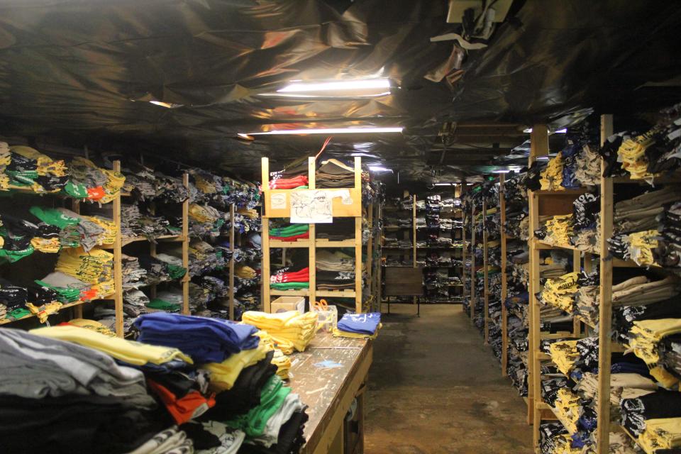 Shirtmandude ships shirts around the world from this storage room located under the 103 Cherry St. location.