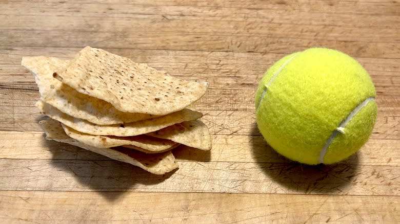 Tortilla chips and tennis ball
