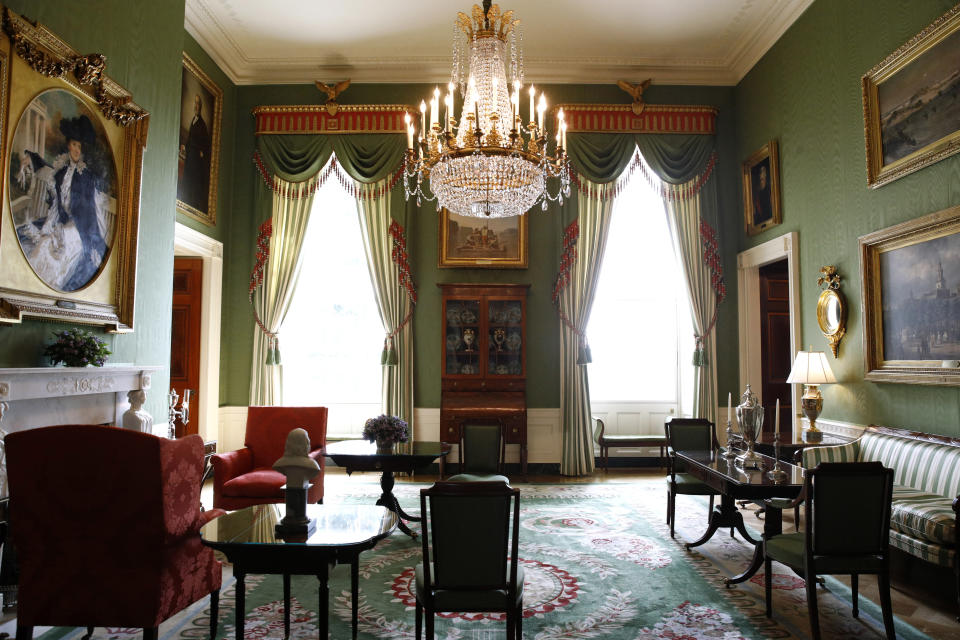 FILE - Repurposed draperies in the Green Room of the White House in Washington, are seen on Sept. 17, 2019. A White House tour is practically a must-do in Washington, though the experience can leave some guests asking questions about spaces they don’t get to see, like the Oval Office. The White House Historical Association has a plan to answer those questions when it opens “The People’s House: A White House Experience,” in the fall of 2024. (AP Photo/Patrick Semansky, File)