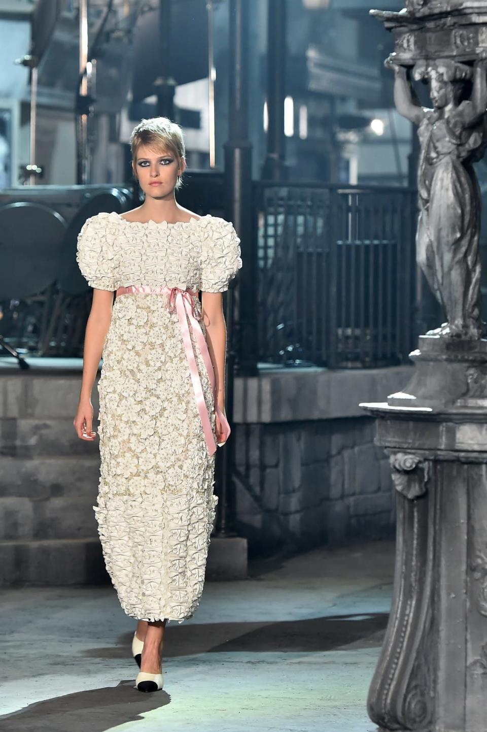 A floral appliqué gown at Chanel’s Métiers d'Art collection in Rome.