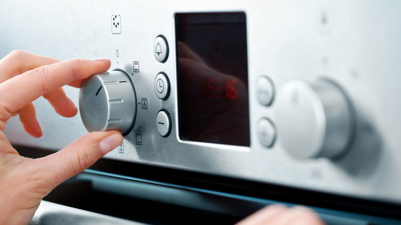 Adjusting oven temperature control