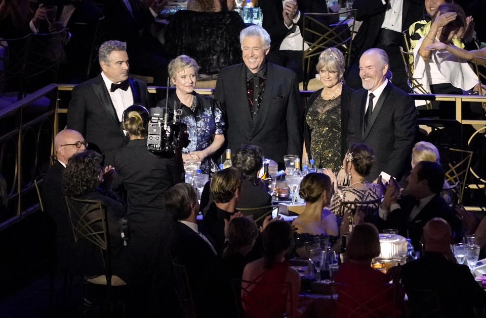 Christopher Knight, from left, Eve Plumb, Barry Williams, Maureen McCormick, and Mike Lookinland stand in the audience for a tribute to "The Brady Bunch" at the 74th Primetime Emmy Awards on Monday, Sept. 12, 2022, at the Microsoft Theater in Los Angeles. (AP Photo/Mark Terrill)