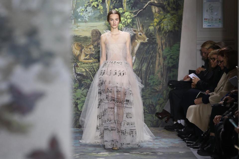 A model presents a creation as part of the Valentino Spring-Summer 2014 Haute Couture fashion collection, presented Wednesday, Jan. 22, 2014 in Paris. (AP Photo/Jacques Brinon)