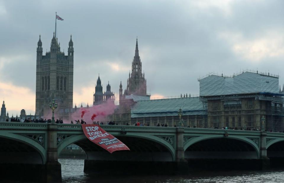 Protesters on Westminster Bridge. Another fevered day is expected in Parliament (PA)