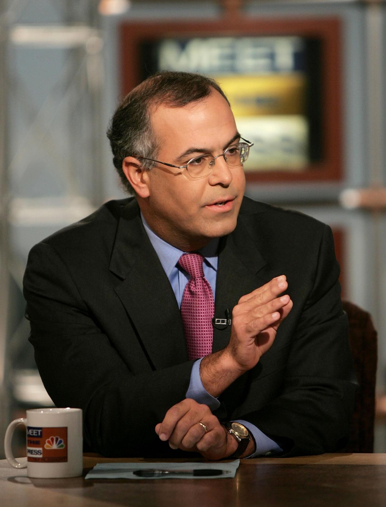 <p>WASHINGTON - SEPTEMBER 25:  New York Times columnist, David Brooks, gestures while speaking on NBC's 