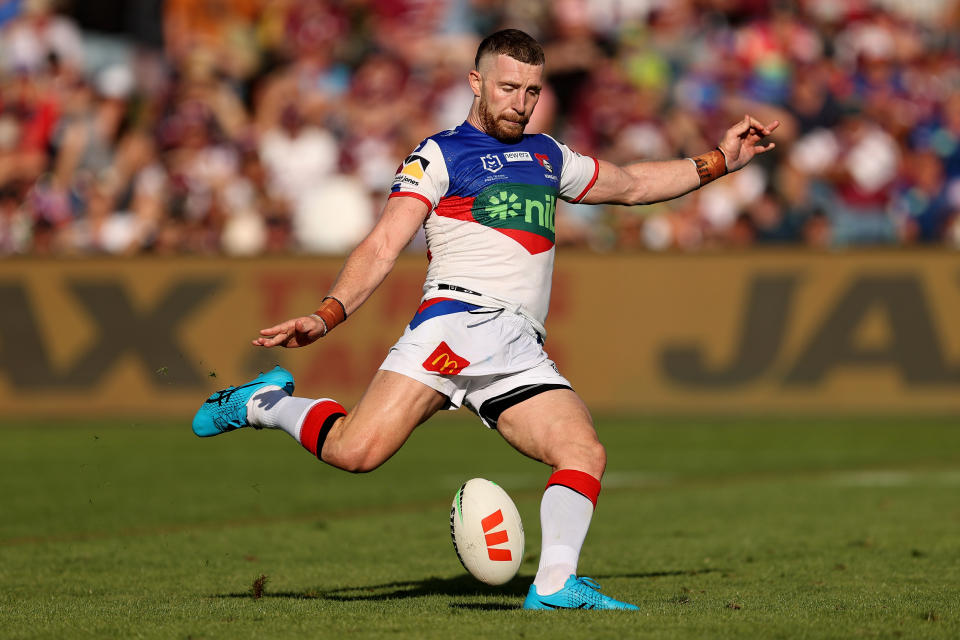 MUDGEE, AUSTRALIA - APRIL 01: Jackson Hastings of the Knights attempts a field goal during the round five NRL match between Manly Sea Eagles and Newcastle Knights at Glen Willow Sporting Complex on April 01, 2023 in Mudgee, Australia. (Photo by Brendon Thorne/Getty Images)