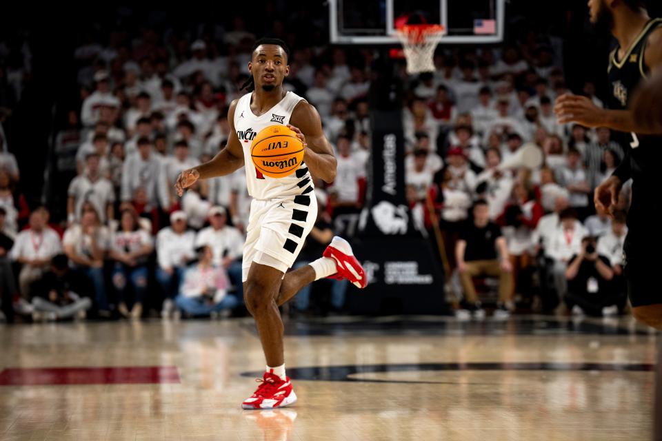 Cincinnati Bearcats guard Day Day Thomas and teammate Jizzle James combined for 11 of UC's 25 turnovers in their loss to No. 10 Iowa State Tuesday night.