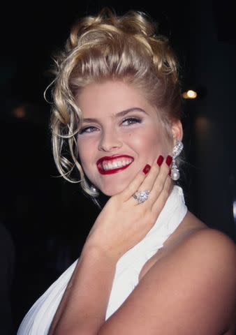 <p>Vinnie Zuffante/Michael Ochs Archives/Getty Images</p> Anna Nicole Smith attends the opening of Planet Hollywood at Caesar's Palace in Las Vegas, Nevada, on July 24, 1994