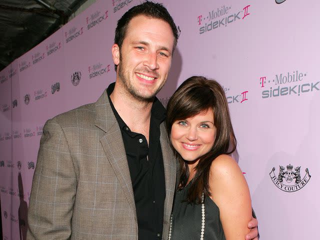 <p>Chris Polk/FilmMagic</p> Brady Smith and Tiffani Thiessen during the T-Mobile Limited Edition Sidekick II Launch.