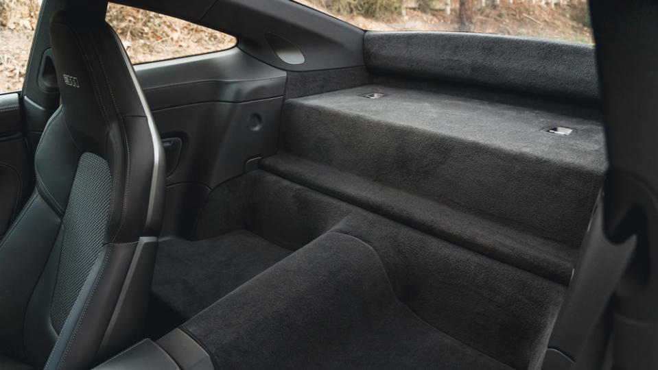 The rear interior of the 2023 Porsche 911 Carrera T.