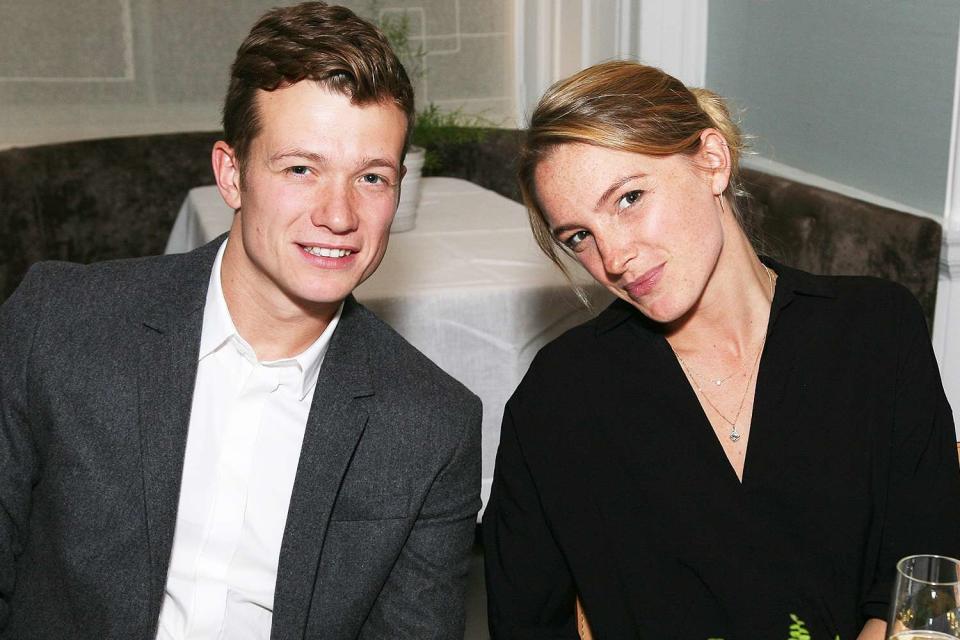 <p>David M. Benett/Dave Benett / Getty Images for COS</p> Ed Speleers and Asia Macey at COS Dinner at Spring