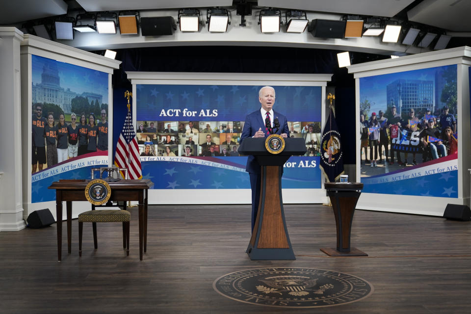 President Joe Biden speaks before signing the "Accelerating Access to Critical Therapies for ALS Act" into law in the South Court Auditorium on the White House campus in Washington, Thursday, Dec. 23, 2021. (AP Photo/Patrick Semansky)