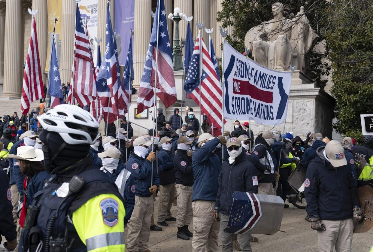 Members of a white supremacist group demonstrate near the National Archives in Washington on Jan. 21, 2022. <a href="https://newsroom.ap.org/detail/PatriotFront/3caaaf6fe498443da3305b2b4ffc7b94/photo?Query=2024%20white%20nationalists&mediaType=photo&sortBy=&dateRange=Anytime&totalCount=748&digitizationType=Digitized&currentItemNo=NaN&vs=true&vs=true" rel="nofollow noopener" target="_blank" data-ylk="slk:AP Photo/Jose Luis Magana;elm:context_link;itc:0;sec:content-canvas" class="link ">AP Photo/Jose Luis Magana</a>