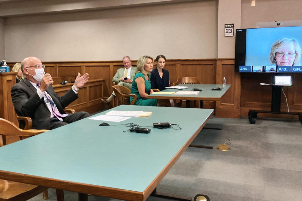 Gary Stamper, an attorney for U.S. Senate candidate and former Missouri Gov. Eric Greitens, responds to concerns about threats made by the public against Greitens' ex-wife, Sheena Greitens, during a child-custody hearing on Thursday, June 23, 2022, at the Boone County Courthouse in Columbia, Mo. An attorney for Sheena Greitens said the threats occurred after Eric Greitens released a campaign video depicting him with a gun hunting "RINOs," or Republicans in Name Only. (AP Photo/David A. Lieb)