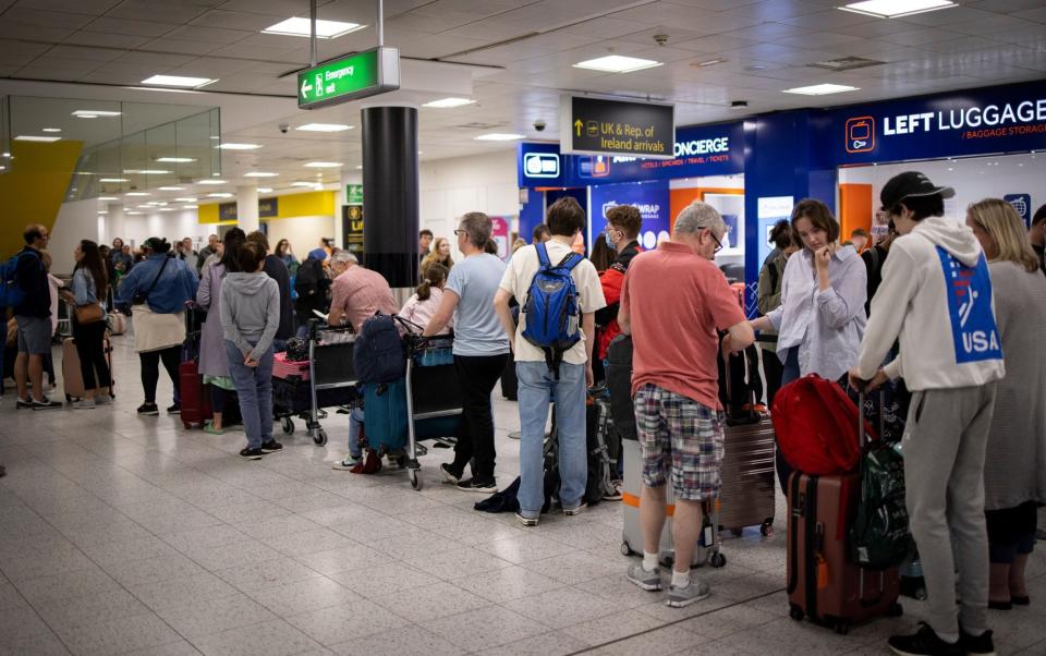 People wait to check in at Gatwick Airport on Tuesday - Tolga Akmen/EPA-EFE/Shutterstock