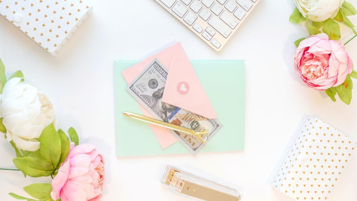 Feminine desk with money