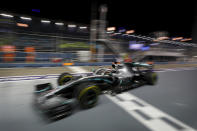 Mercedes driver Lewis Hamilton of Britain steers his car during the second practice session at the Marina Bay City Circuit ahead of the Singapore Formula One Grand Prix in Singapore, Friday, Sept. 20, 2019. (AP Photo/Vincent Thian)