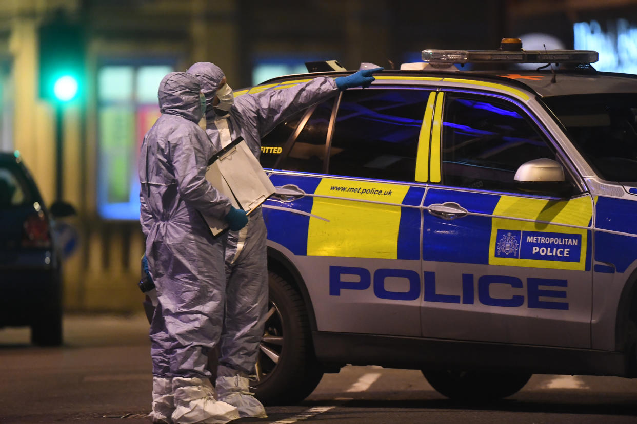 A police forensics officers works at the scene in Streatham High Road, south London after a man was shot dead by armed officers, with police declaring the incident as terrorist-related. (Photo by Victoria Jones/PA Images via Getty Images)
