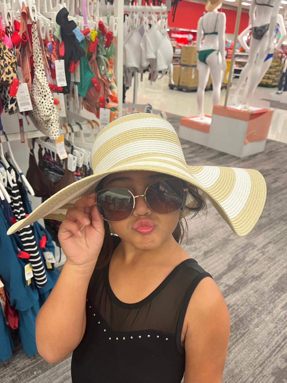 Kiali Vazquez Rodriguez, 6, mugs for the camera. Kiali and her family visited HCA Florida Sarasota Doctors Hospital Monday, to thank the Emergency Department staff for the care she received on Aug. 21, after she had a COVID-19-induced asthma attack.