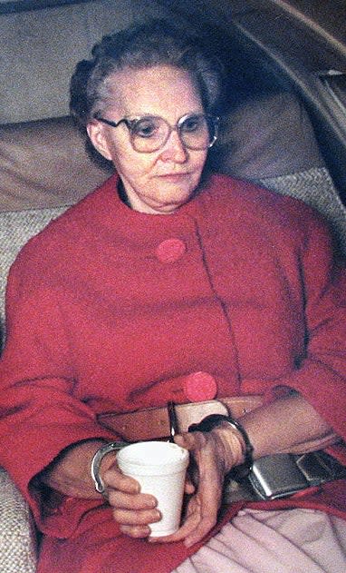 Closeup of Dorothea Puente in handcuffs