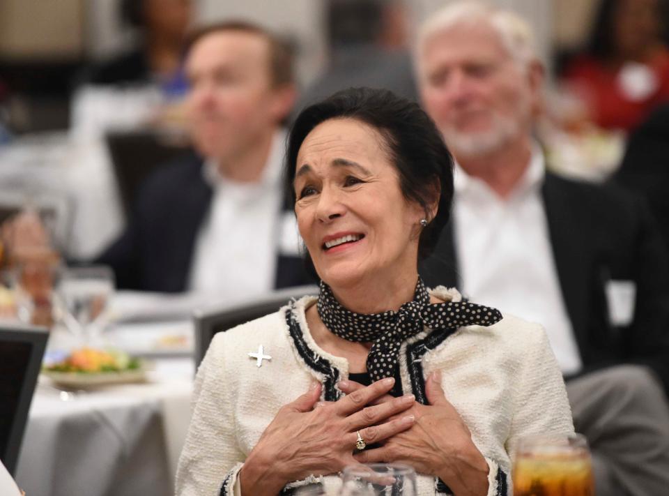 Mar 22, 2024; Tuscaloosa, Alabama, USA; The Black Warrior Council of the Boy Scouts of America honored Pettus and Cathy Randall with the Circle of Honor distinction Friday. Randall reacts as she watches a video of people speaking about the contributions she and her husband have made to Tuscaloosa.