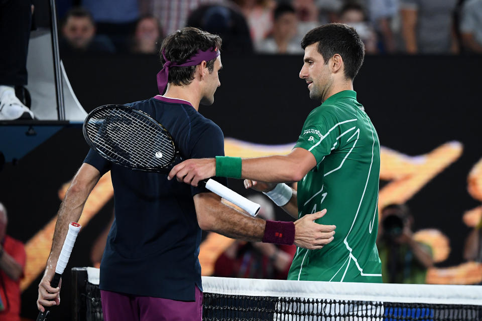 Novak Djokovic shakes hands with Roger Federer after their Men's Singles Semifinal match at the 2020 Australian Open.