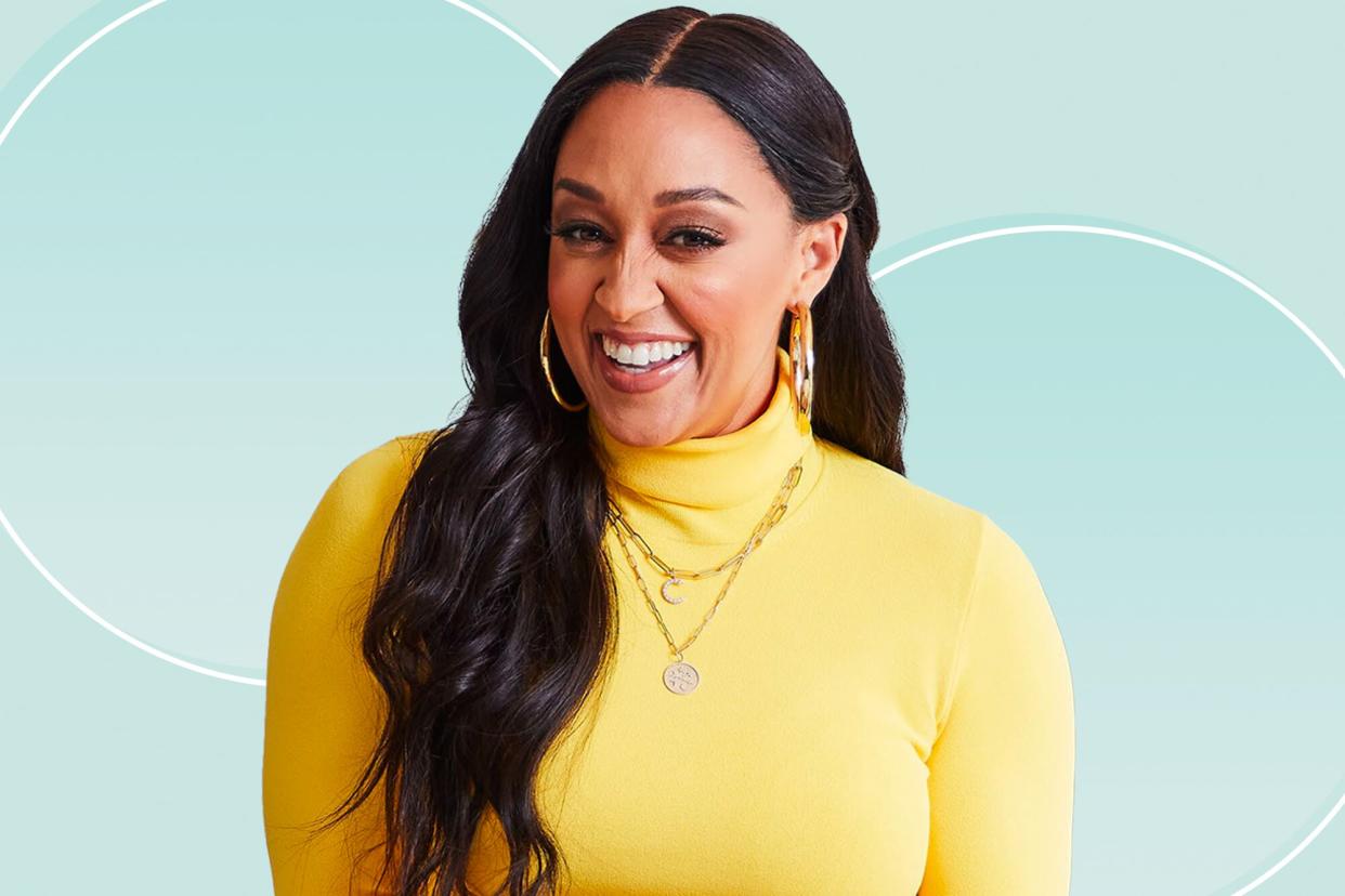 Tia Mowry on a designed background