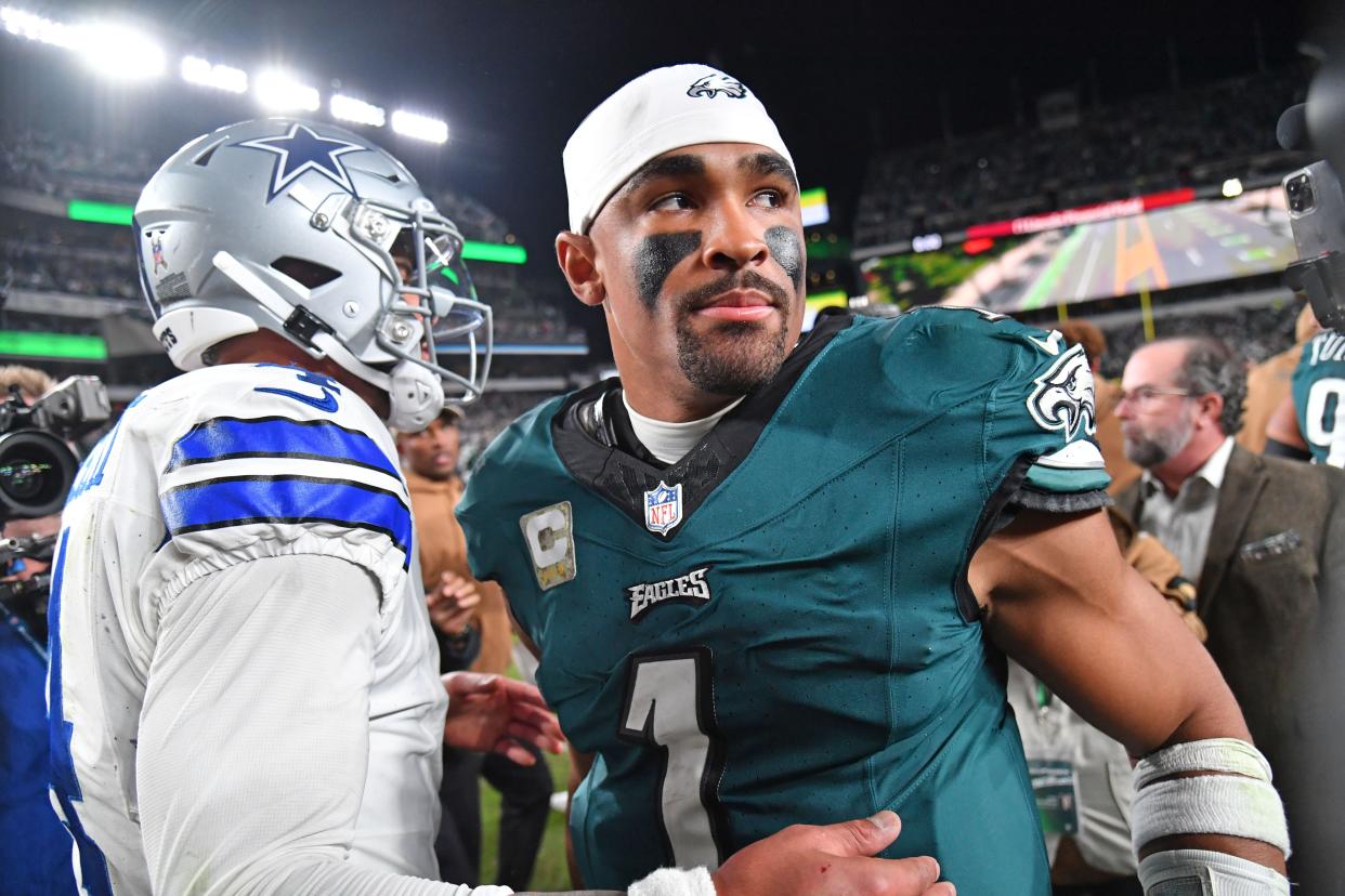 Nov 5, 2023; Philadelphia, Pennsylvania, USA; Dallas Cowboys quarterback Dak Prescott (4) and Philadelphia Eagles quarterback Jalen Hurts (1) meet on the field after Eagles win at Lincoln Financial Field. Mandatory Credit: Eric Hartline-USA TODAY Sports