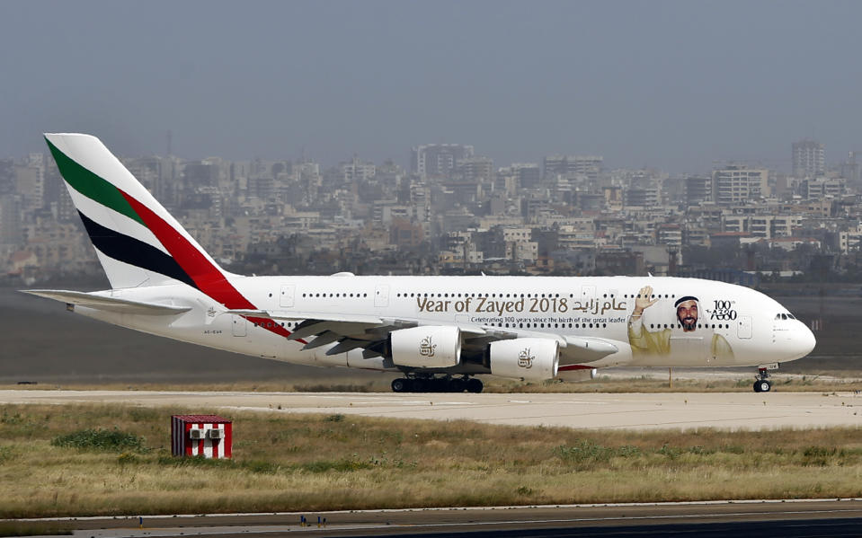 FILE - In this March. 29, 2018, file photo, a double-decker Airbus A380 plane lands at the Rafik Hariri International Airport in Beirut, Lebanon. Airbus said Thursday, Feb. 14, 2019 it will stop making A380 superjumbo jets in 2021 after struggling to win clients. (AP Photo/Bilal Hussein, File)