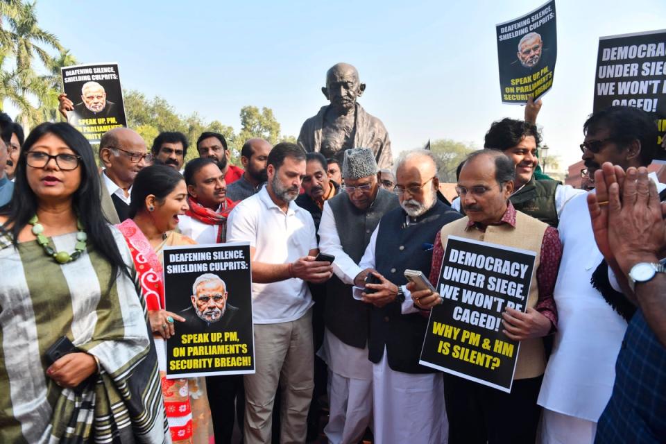 Congress party leader Rahul Gandhi, center, join other lawmakers in a protest against the suspension of lawmakers, in New Delhi, India, Tuesday, 19 December 2023 (AP)