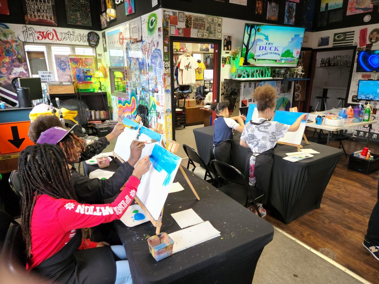 Black Youth Alliance participants paint as part of one of their weekly field trips during the summer 2022 programming.