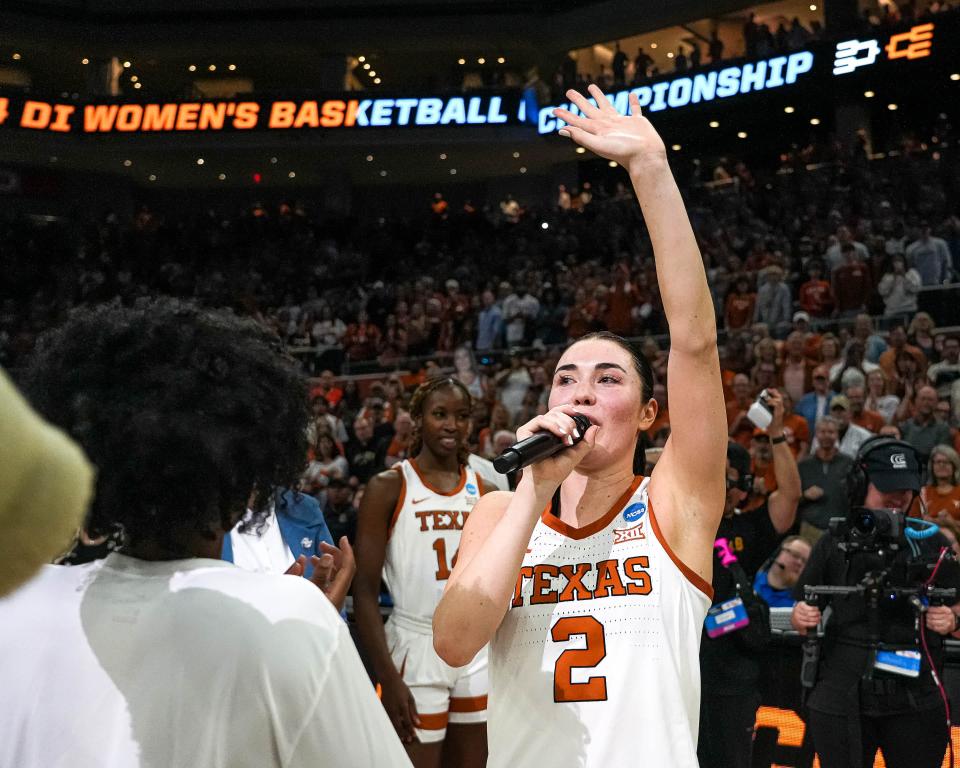 Texas guard Shaylee Gonzales waves to the Moody Center crowd after Sunday night's 65-54 win over Alabama in the NCAA Women's Tournament. The win advanced top-seeded Texas to the Sweet 16, which will be Gonzales' first after four years at BYU and her first two at Texas.