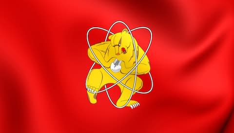 Zheleznogorsk's flag shows a bear getting to grips with an atom - Credit: GETTY