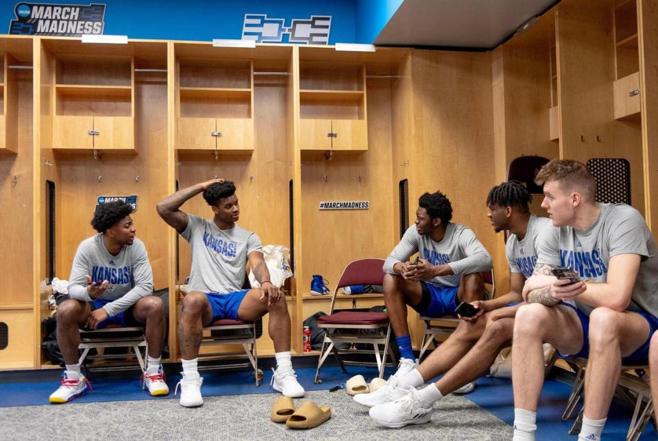 Kansas players talk in the locker room before a team shoot around a day ahead of Kansas’ first round game against Howard in the NCAA college basketball tournament Wednesday, March 15, 2023, in Des Moines, Iowa.