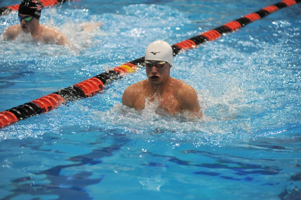 Lexington's Ivan Pykhodko swims the breaststroke leg of the 200 medley relay.