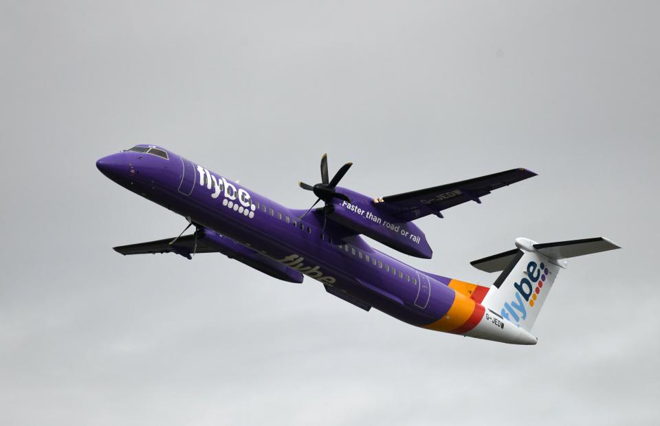 This picture shows a Dash 8 Q400 of Flybe airline during take-off on September 24, 2019 at the airport in Duesseldorf, western Germany. (Photo by INA FASSBENDER / AFP) (Photo by INA FASSBENDER/AFP via Getty Images)