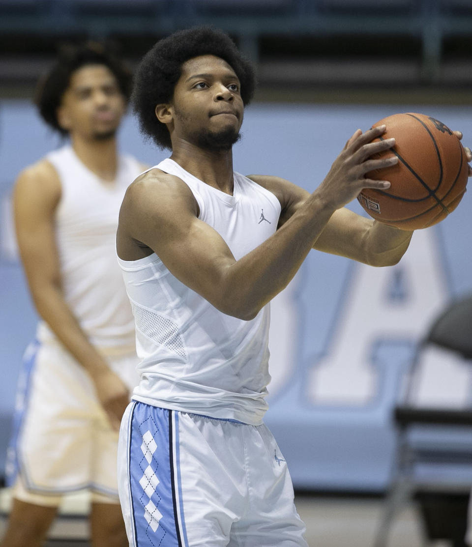 North Carolina's Kerwin Walton (24) works on his shooting form prior to the Tar Heels' game against Marquette on Wednesday, February 24, 2021 at the Smith Center in Chapel Hill, N.C. (Robert Willett/The News & Observer via AP)